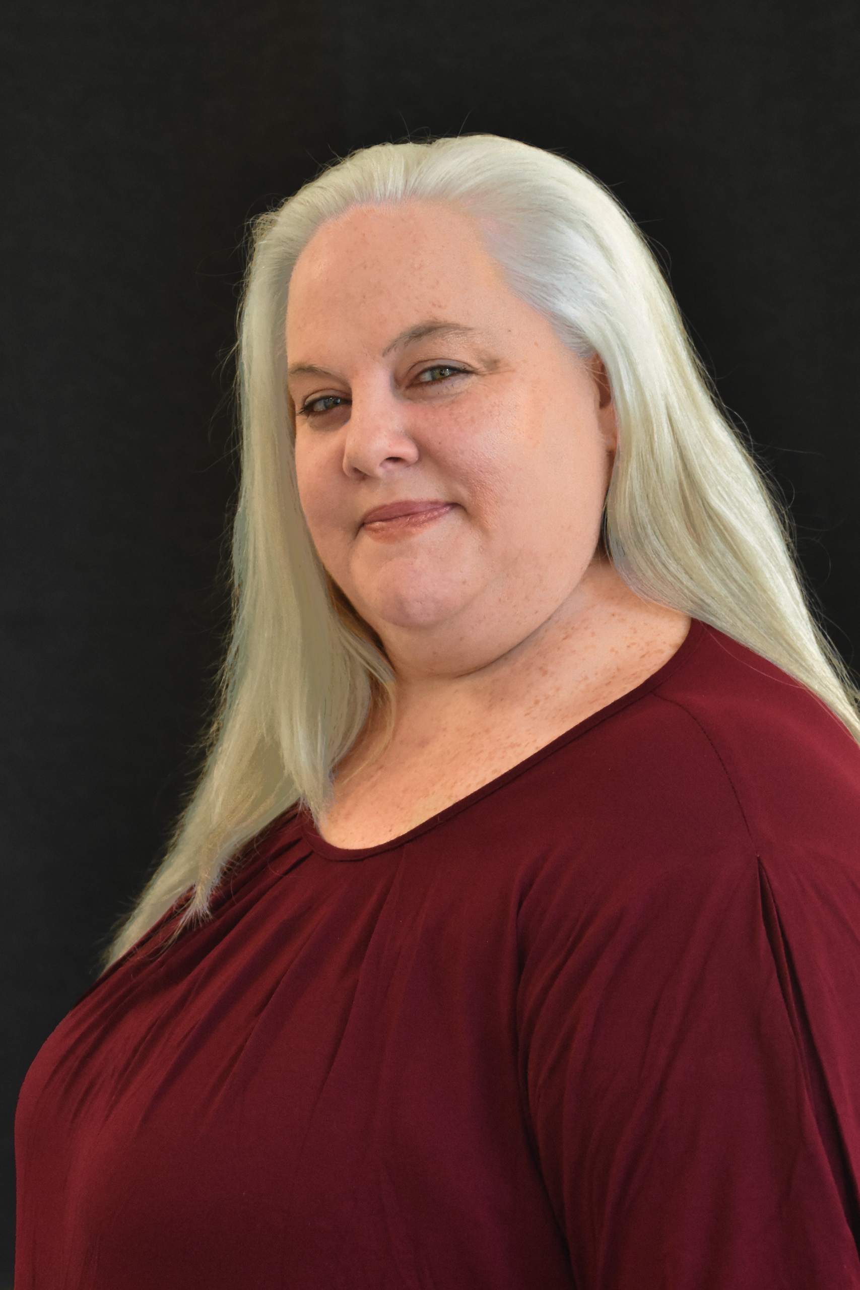 Sasha Hildebrand is a seasoned actor, director, and costume designer with over 20 years in the industry. Trained at the Liverpool Institute for the Performing Arts and the University of Iowa, her career spans stages from London’s Fringe Festivals to Chicago’s Drury Lane and the Texas Shakespeare Festival. With more than 45 directing credits and 75 costume designs, she is equally devoted to teaching, shaping the next generation of theatre artists.